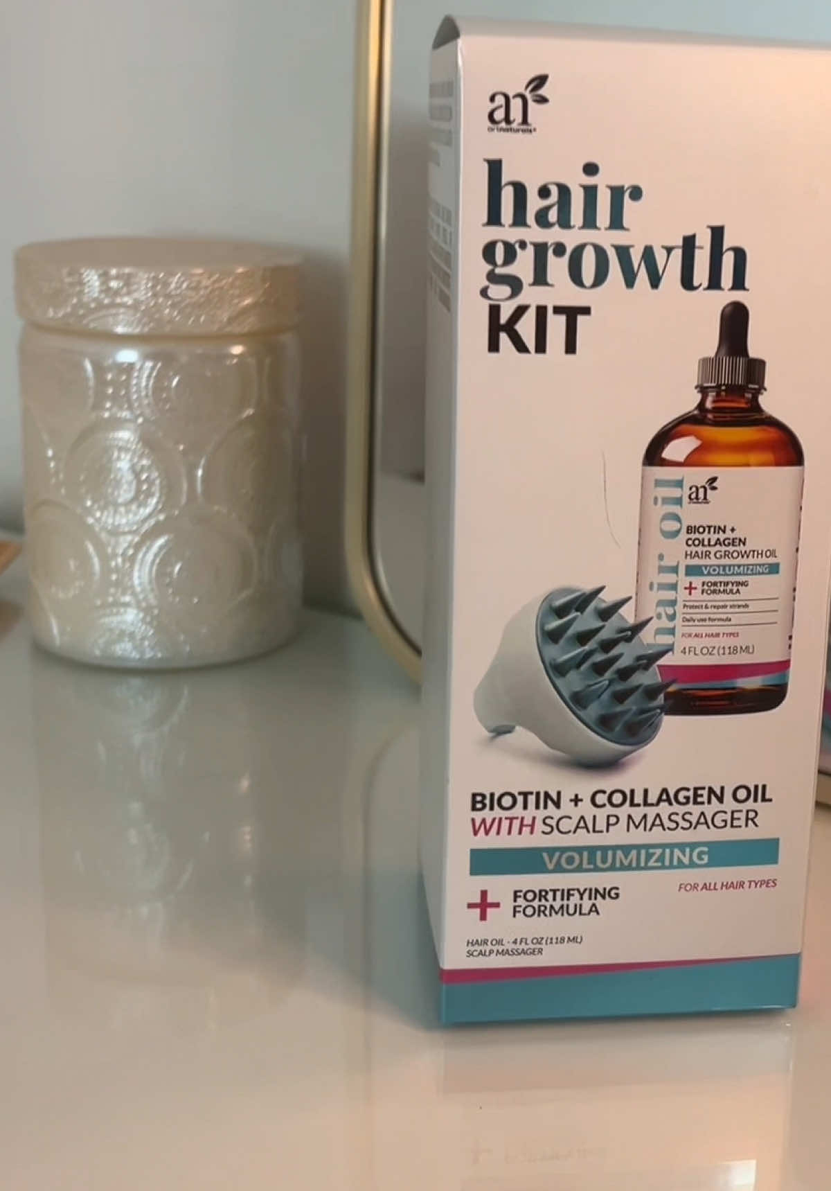 TikTok post by @lil0ush for artnaturals. Caption reads: …with the right product of course🌿 @artnaturals ....