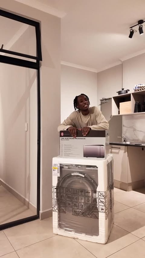 Instagram post by @paulblaze_ for Russell Hobbs. Caption reads: Just unboxed my Russell Hobbs 30L Solo Microwave....
