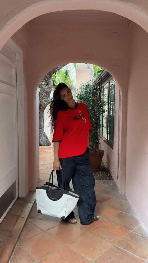 Instagram post by @sandrashehab for STAUD. Caption reads: Ready for spring in @staud.clothing @birkenstock....
