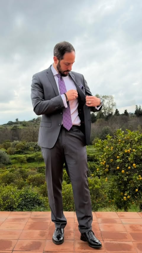 Instagram post by @renato_amburgo for OTAA. Caption reads: Accessories by @otaa - #suitandtie #abitouomo....