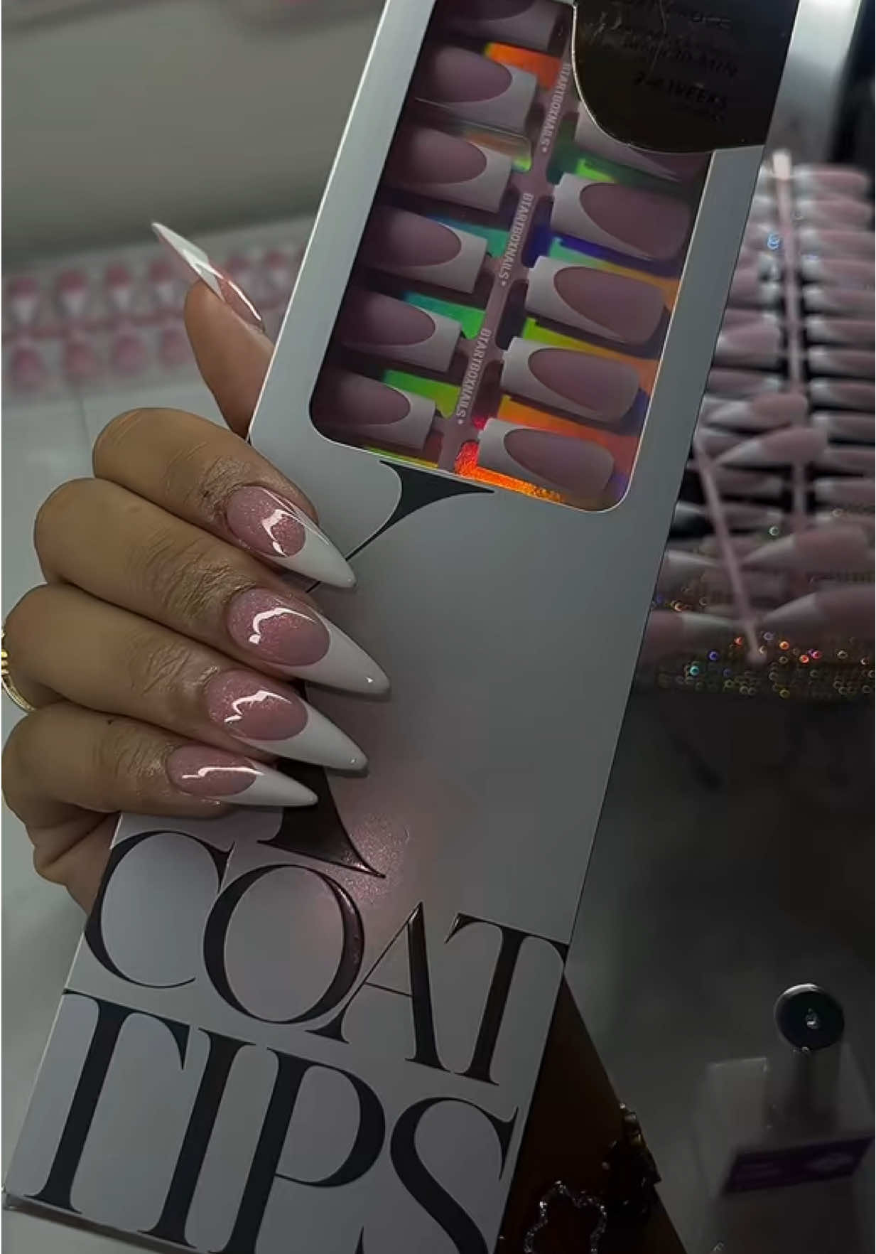 TikTok post by @nailz_by_ashleyyy for BTArtboxnails. Caption reads: [...] are BACK! Wearing “long stiletto”....