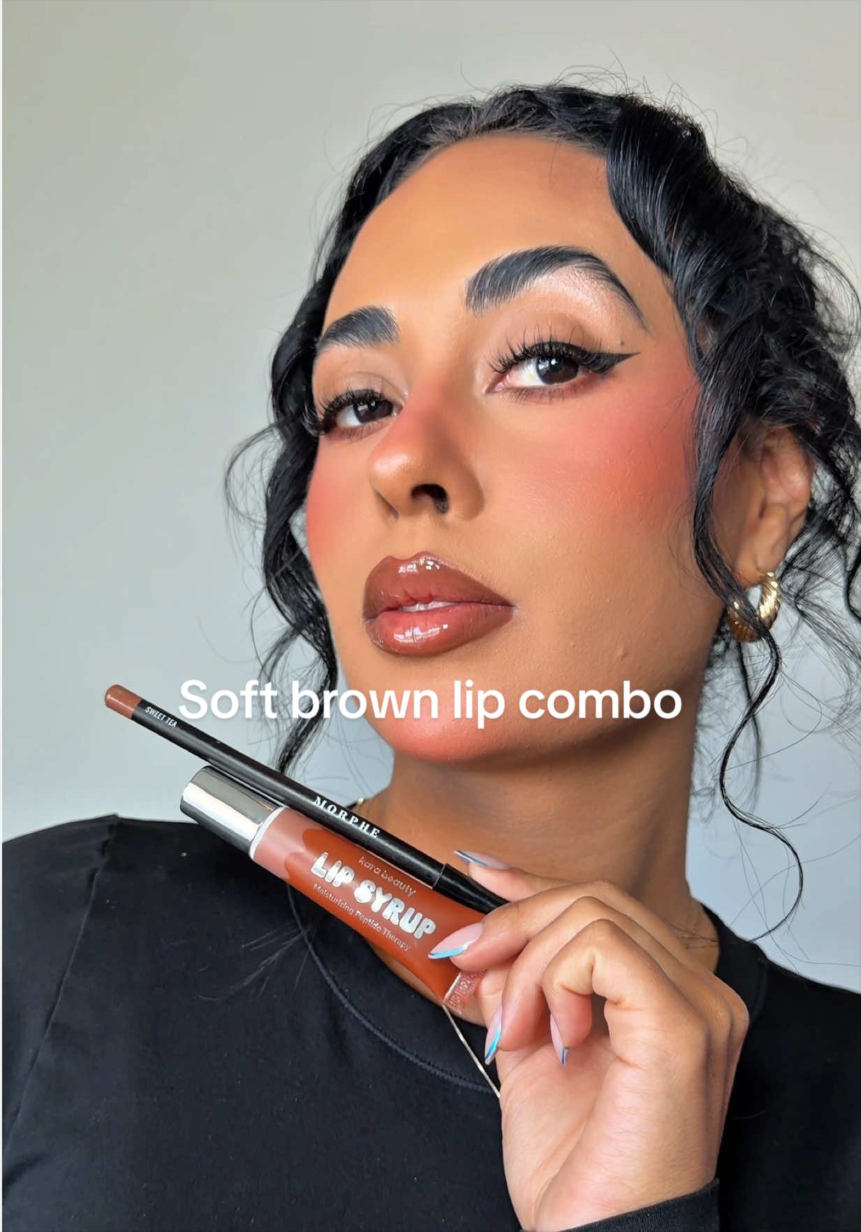 TikTok post by @angiely.goodman for Kara Beauty. Caption reads: [...] #lipcombotutorial #lipcombotiktok @Kara....