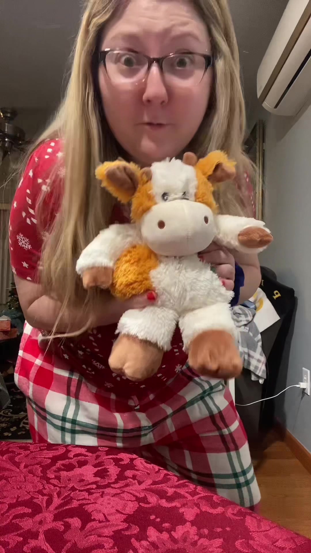 TikTok post by @dodgergirl1222 for Warmies. Caption reads: [...] my Warmie: Pumpkin Spice Latte Cow ❤️....