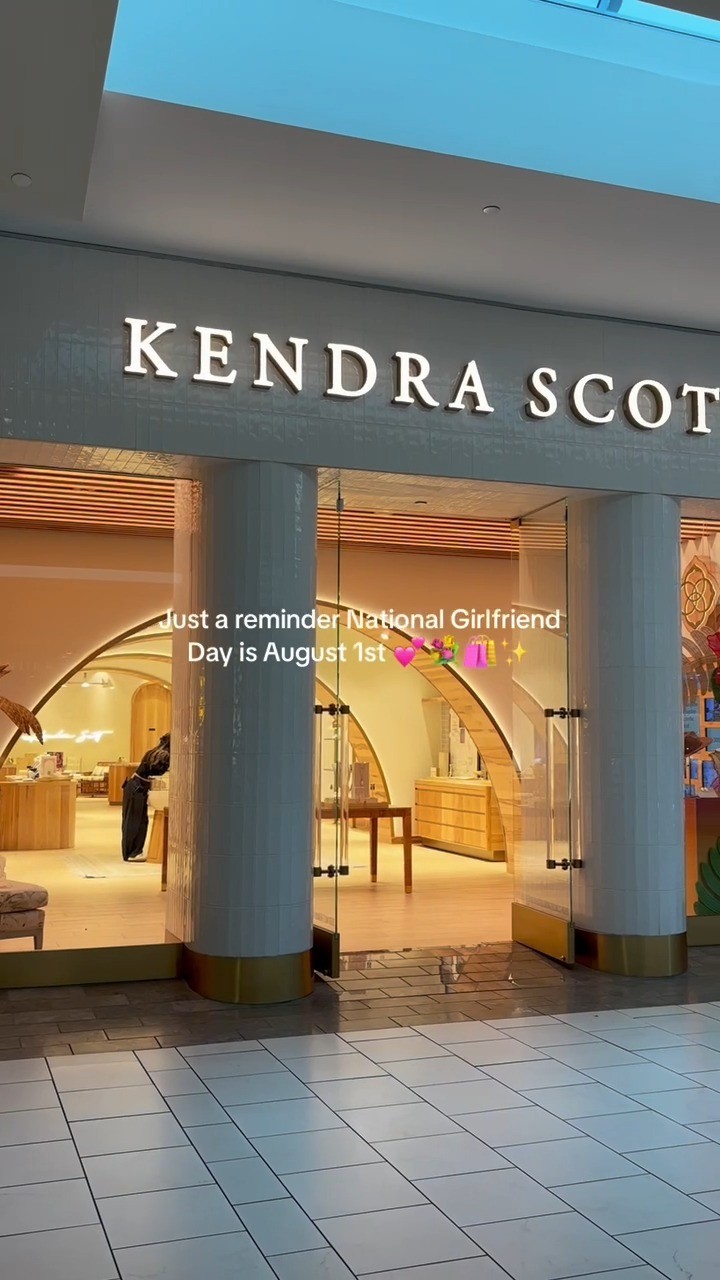 Instagram post by @shopdadeland for Kendrascott. Caption reads: Spoil your girl this National Girlfriend Day with....