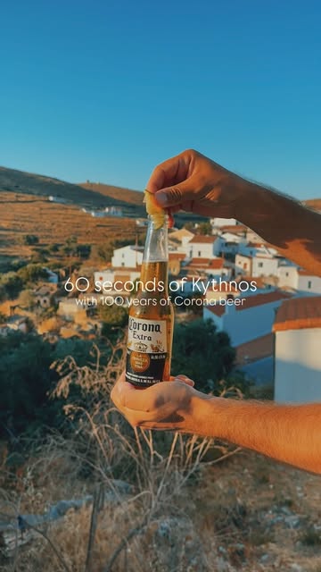 Instagram post by @stef_greece for Corona. Caption reads: 🏝 Kythnos, with its endless coastline,....