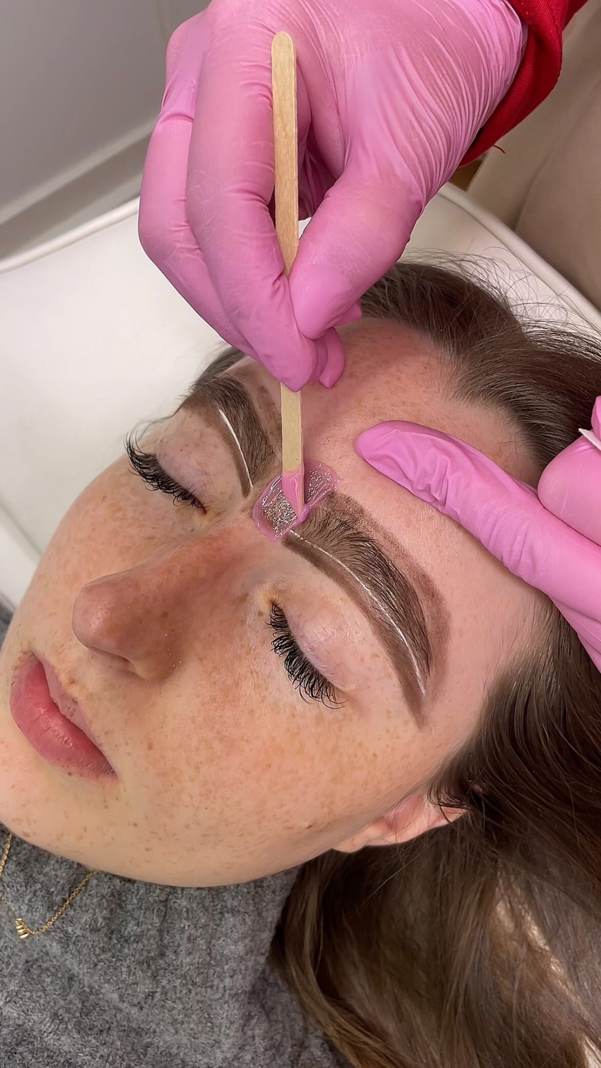 Instagram post by @totalbeautylauren for Beautiful Brows & Lashes. Caption reads: I love watching long brow waxing videos + the....