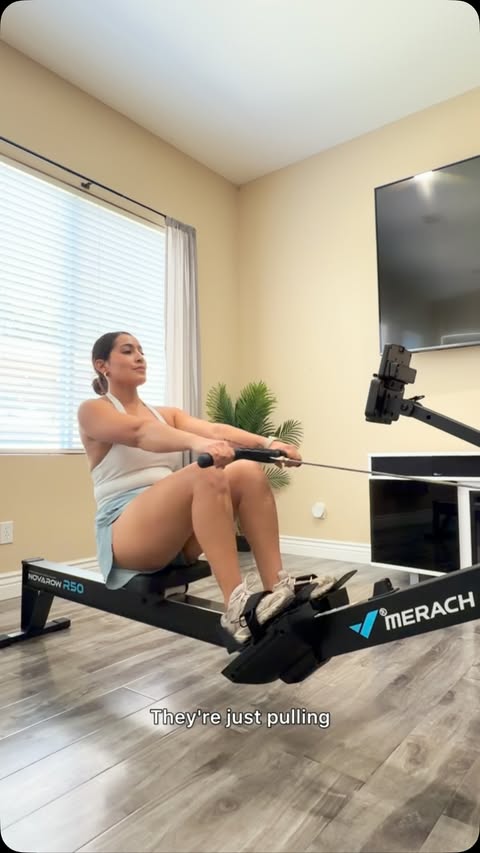 Instagram post by @twotimingmom for Merach. Caption reads: The MERACH NovaRow R50 Pro is linked in my bio.....