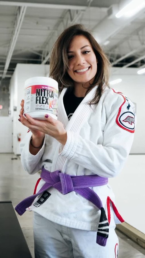 Instagram post by @lynnettelizbjj for GAT Sport. Caption reads: Because showing up isn’t enough — energy & focus....