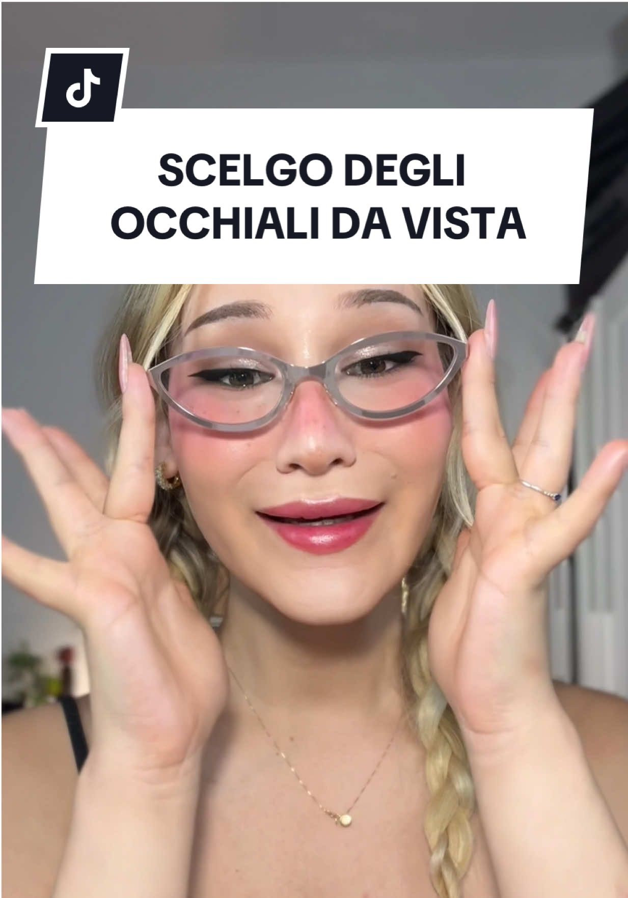 TikTok post by @psychelangelo for Firmoo. Caption reads: AIUTATEMI A SCEGLIERE DEGLI OCCHIALI DA VISTA 🤓✨....