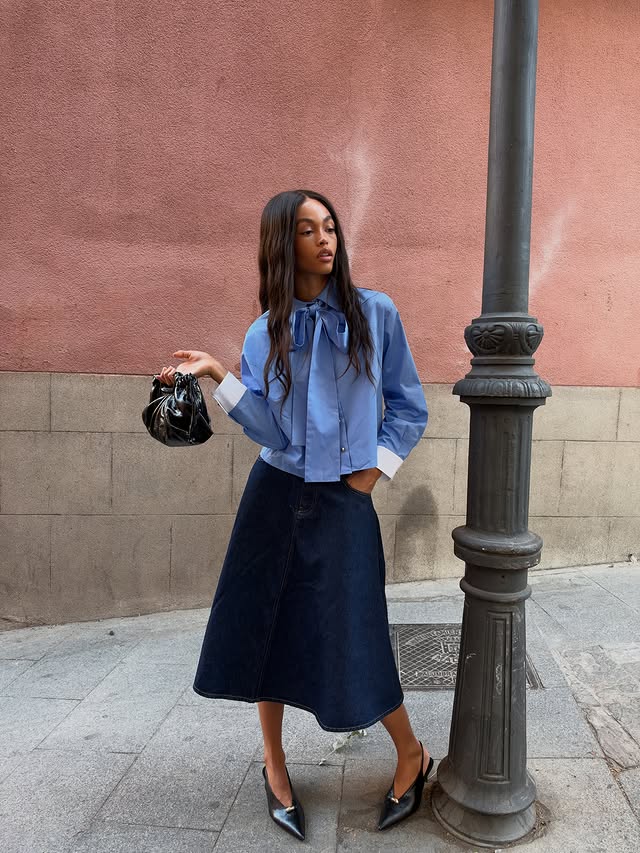 Instagram post by @cristinacheni for Maje. Caption reads: No need to tie a tie with @majeparis Wearing the....