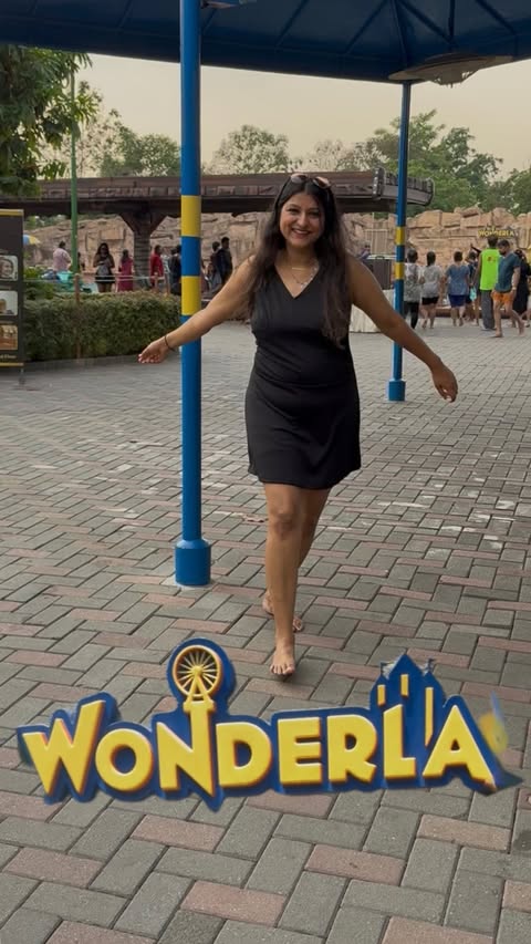 Instagram post by @pooochieekoo for Wonderla Holidays. Caption reads: Summer’s here, and Wanderla is calling! 🌞️🔥 Beat....