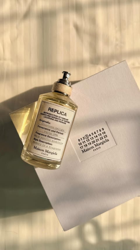 Instagram post by @dewydisposition for Maison Margiela Fragrances. Caption reads: @maisonmargielafragrances Replica Afternoon....
