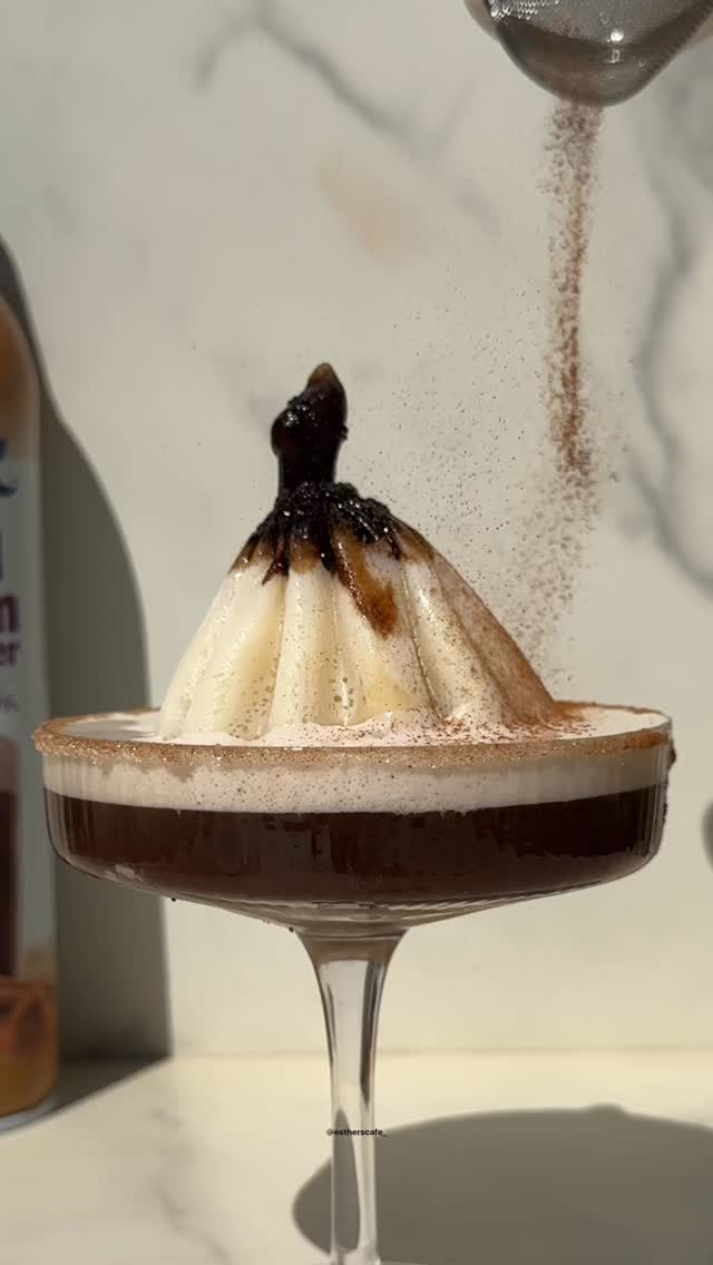 Instagram post by @estherscafe_ for Silk. Caption reads: ☕️🎀 cinnamon girl latte 

Recipe
🎀 rim -....