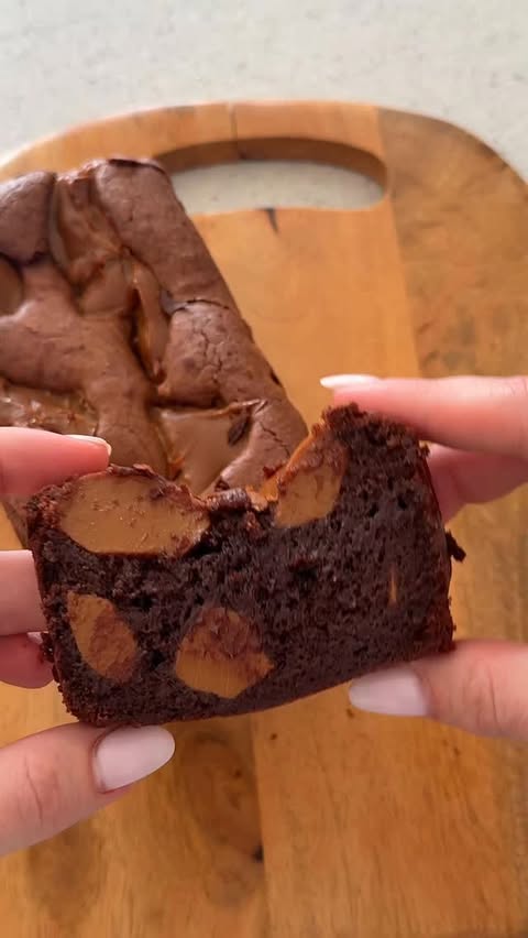 Instagram post by @missgabyte for Žemaitijos pienas. Caption reads: Pats skaniausias brownie visame pasaulyje 🍫 250g....