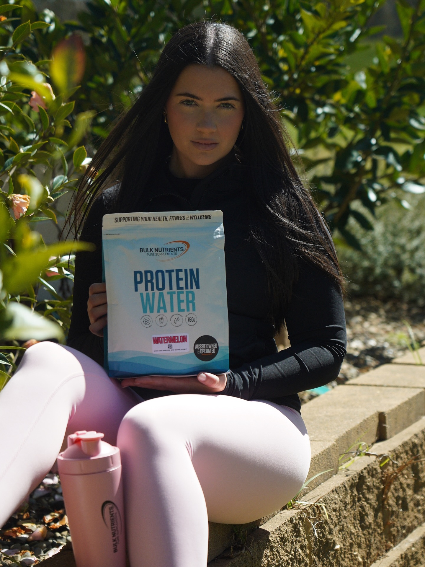 Instagram post by @indycarmody for Bulk Nutrients. Caption reads: Watermelon protein water is finally here!! 💦 🍉....