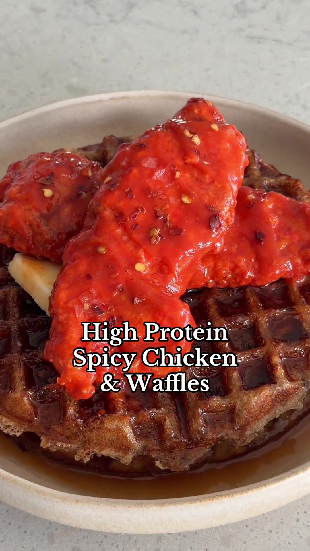 TikTok post by @doosifit for GNC. Caption reads: HIGH PROTEIN, LOW CALORIE Spicy Chicken and....