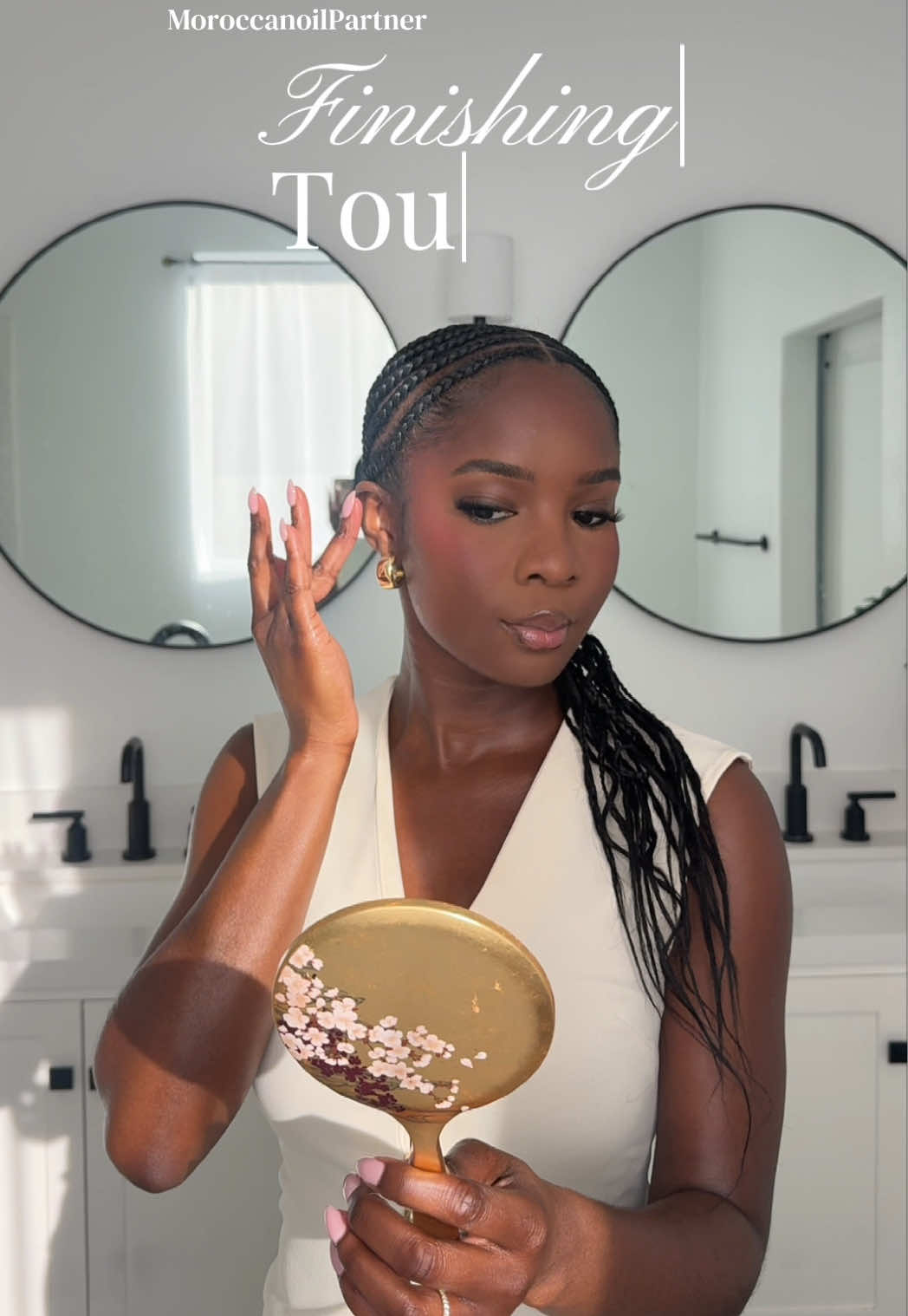 TikTok post by @ayomideadeduro for Moroccanoil. Caption reads: a little shine goes a long way with @Moroccanoil....