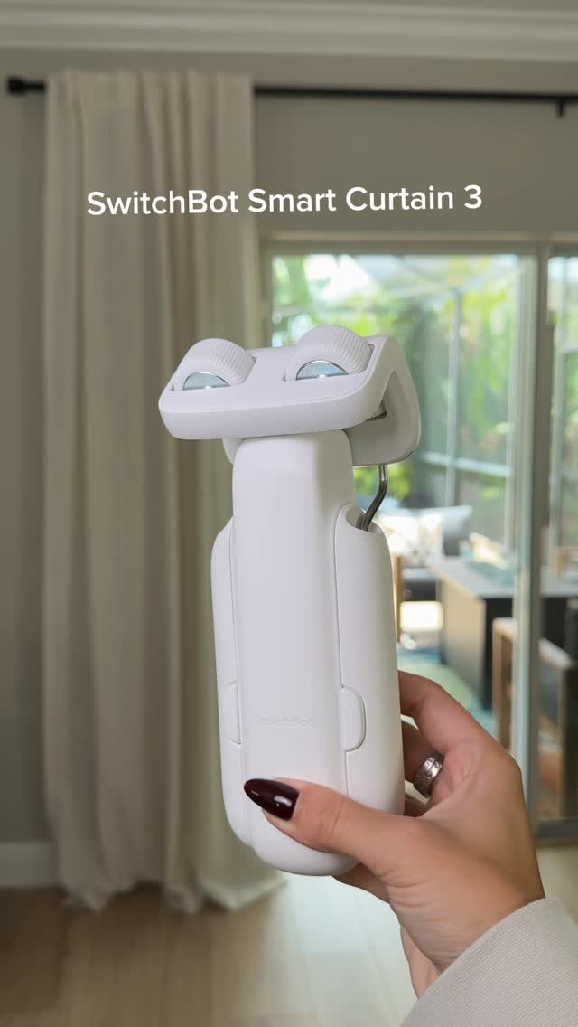 Instagram post by @alimomlife for SwitchBot. Caption reads: [...] curtains every day. Thanks to @theswitchbot....