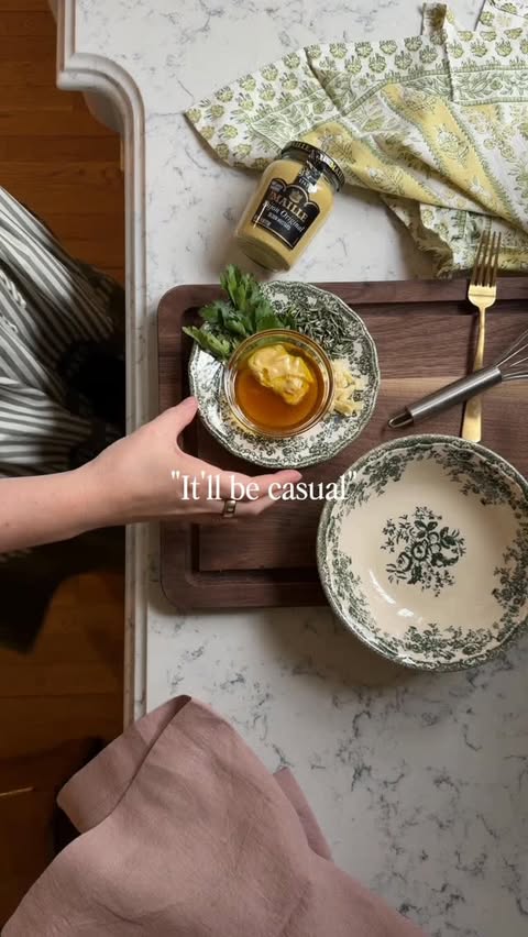Instagram post by @prettyinthepines for La Maison Maille. Caption reads: Spring lunch under the flowers 🌿Every dish had....