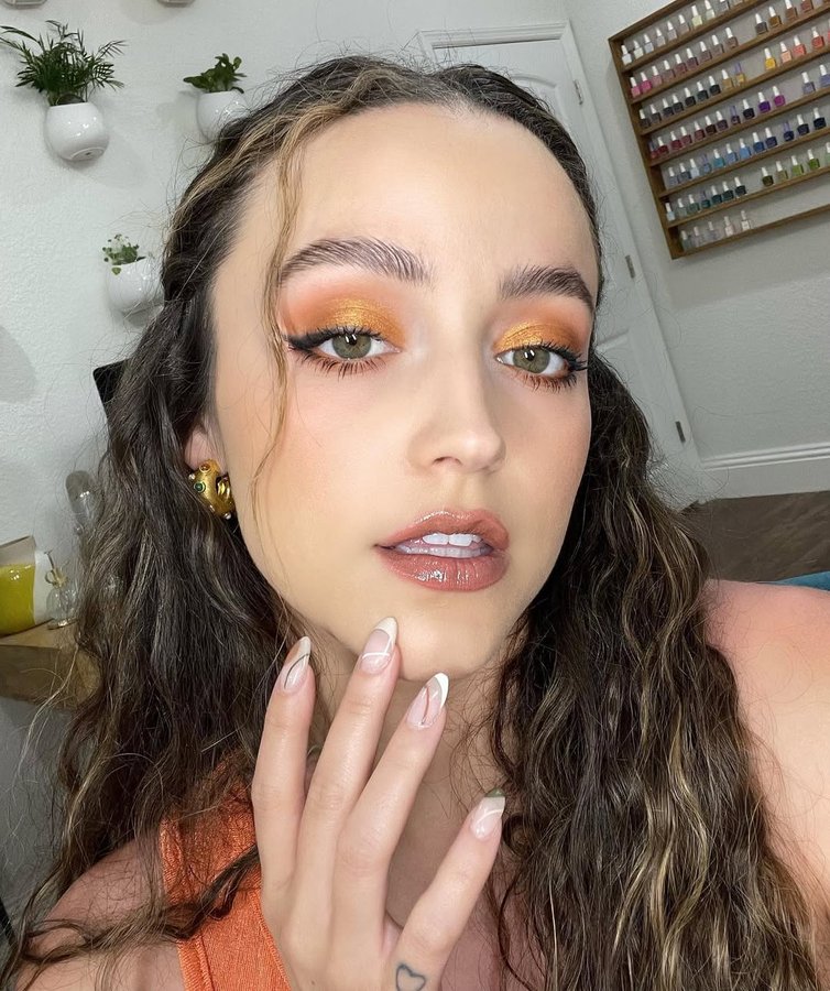 Instagram post by @kathleenlights for BOXYCHARM. Caption reads: [...] Wearing all the products in my April....
