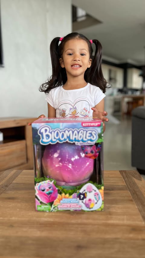 Instagram post by @champagne_and_chaos for Prima Toys. Caption reads: Yuva is having endless fun and cuddles with her....