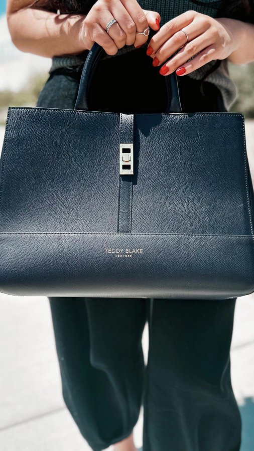 Instagram post by @pollyanabschandler for Teddy Blake. Caption reads: 𝗖𝗹𝗮𝘀𝘀𝗶𝗰. 𝗖𝗵𝗶𝗰. 𝗧𝗶𝗺𝗲𝗹𝗲𝘀𝘀.....