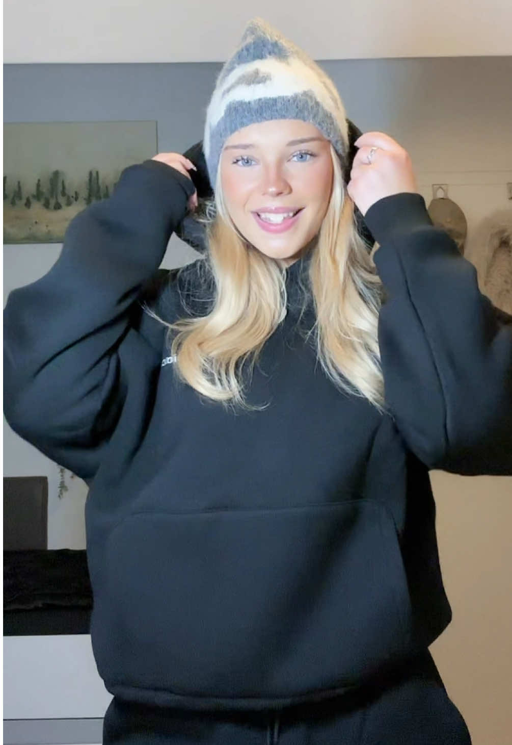 TikTok post by @who_tf_is_elli_ for Lucid Club. Caption reads: Tracksuit from @Lucid Club 💞🤭.