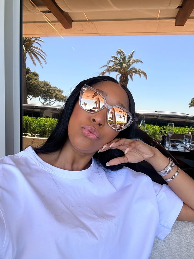 Instagram post by @minniedlamini for Sunglass Hut. Caption reads: 🤍🤍🤍 🕶️: @sunglasshut #sunglasshut....