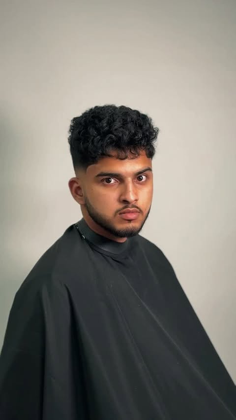 Instagram post by @tonithebarber for Booksy. Caption reads: Every fade started with faith and a clipper ✨....