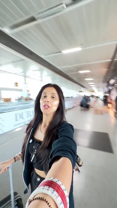 Instagram post by @nidhikumardance for Etihad Airways. Caption reads: [...] your travel partner & book now 🤍....