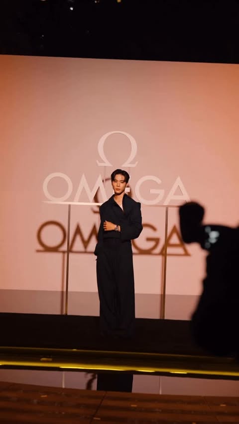 Instagram post by @jackgohr for OMEGA. Caption reads: the ocean called, in Chongqing, China. 🌊....