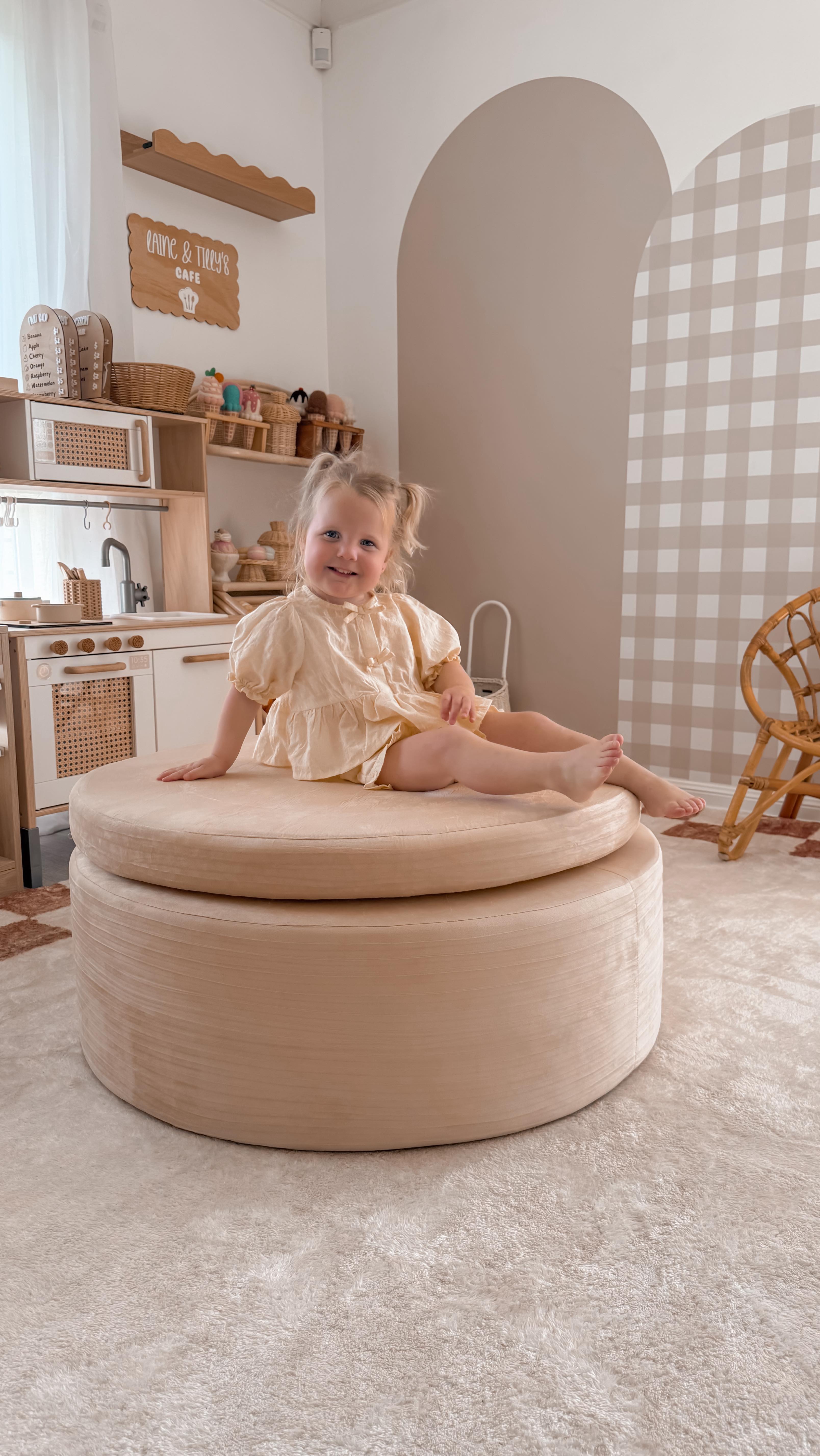 Instagram post by @tilly.and.laine for Miss Amara. Caption reads: The play ottoman from @bubdalife is a must have....