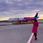 Instagram post by @alessiaclementi for Wizz Air. Caption reads: In my WIZZ era 🩷✈️ 

#wizzair....