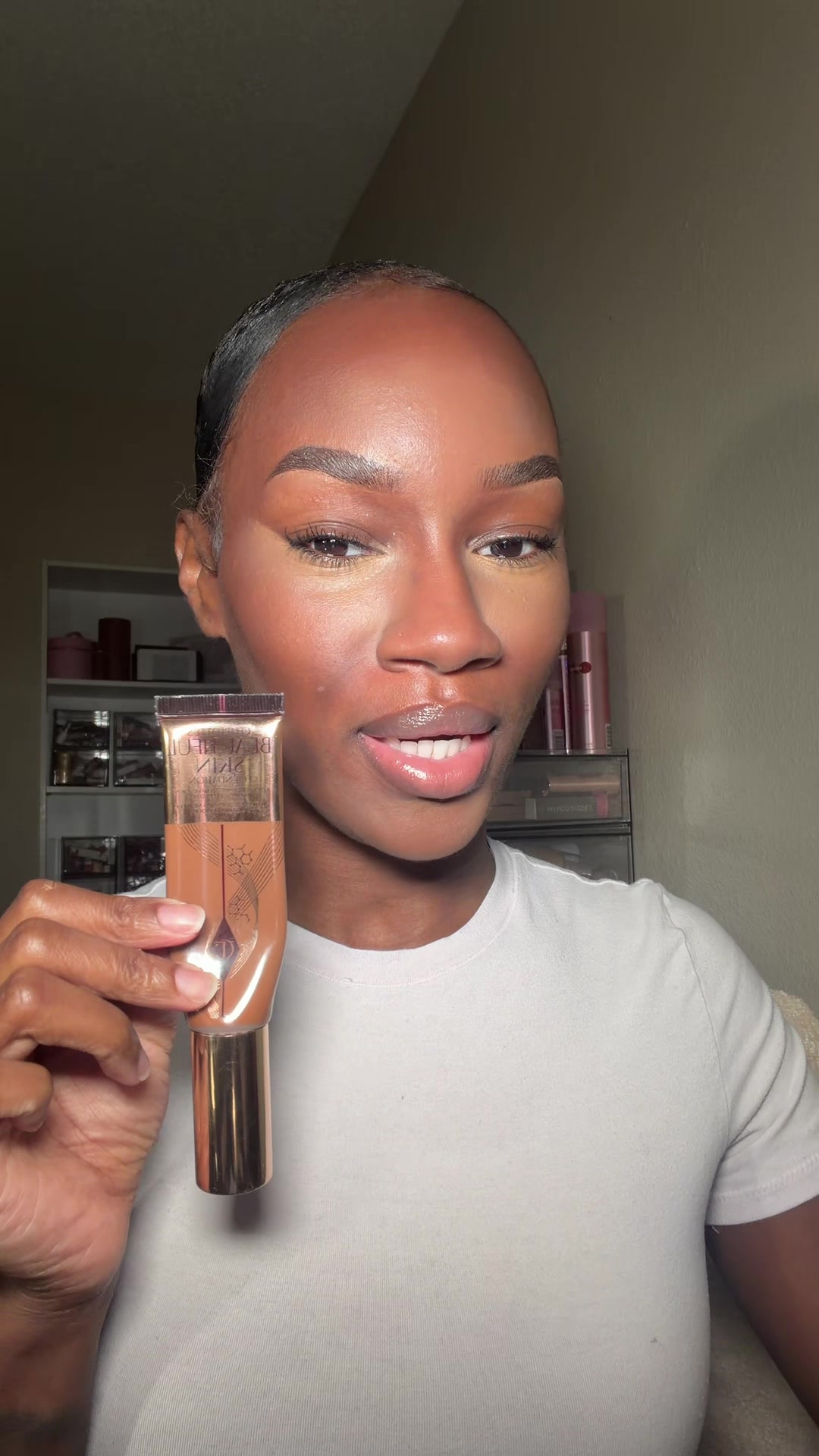 TikTok post by @faceoftionne for BK Beauty. Caption reads: [...] Tilbury Beautiful Skin Foundation 15N @BK....