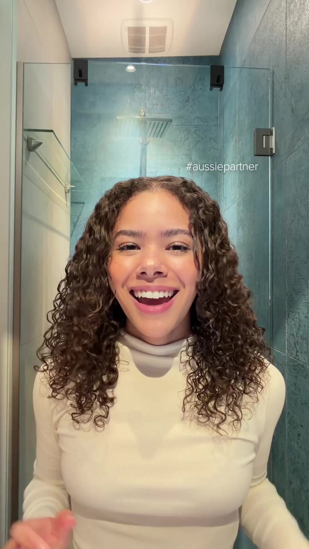 TikTok post by @antoniabgentry for Aussie Hair. Caption reads: [...] here first! I'm excited to be joining@Aussie....