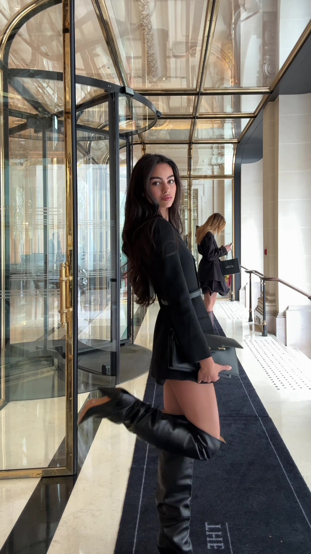 TikTok post by @nicoleisgod for Clinique. Caption reads: my travel must-have @Clinique moisture surge 100H....