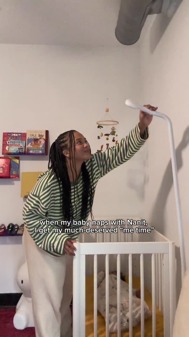 Instagram post by @averycadrien for Nanit. Caption reads: Admiring Prudence from afar with @get_nanit 😍 📲....