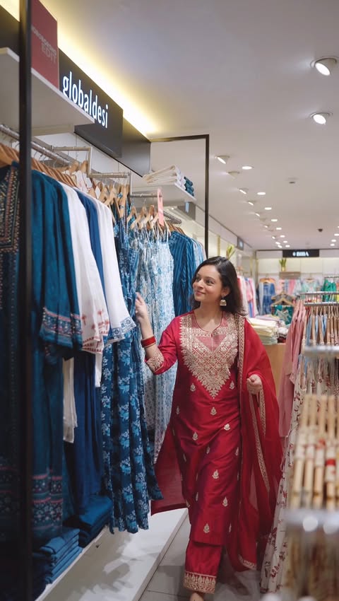 Instagram post by @megha.dasgupta for Shoppers Stop. Caption reads: [...] e-voucher. 🌸 #collab #PoilaBoishakh....