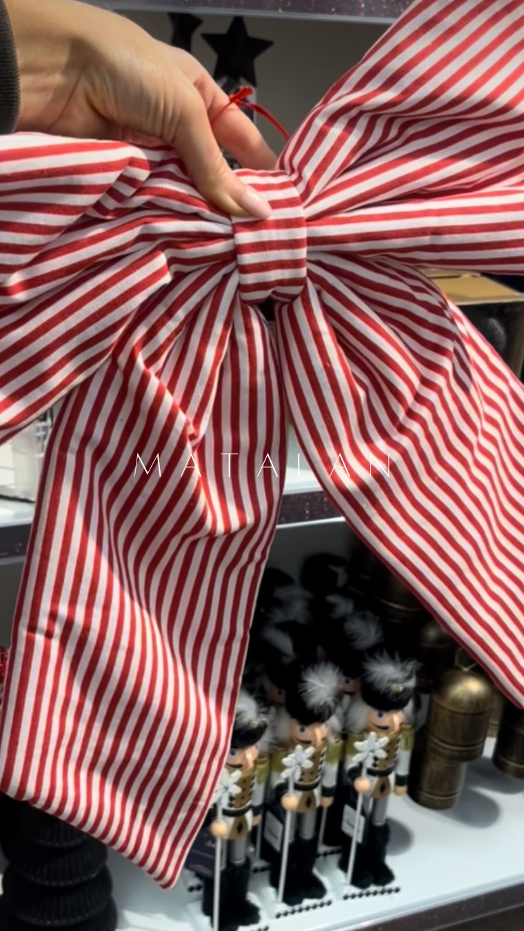 Instagram post by @homeslovehighstreet for Matalan. Caption reads: That first candy cane bow 😫😫 I’m obsessed!....