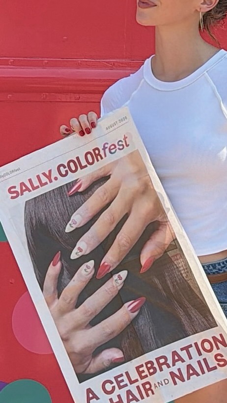 Instagram post by @mikah.rae for Sally Beauty. Caption reads: #SallyBeautyPartner 💓👜💄 loved having [...].