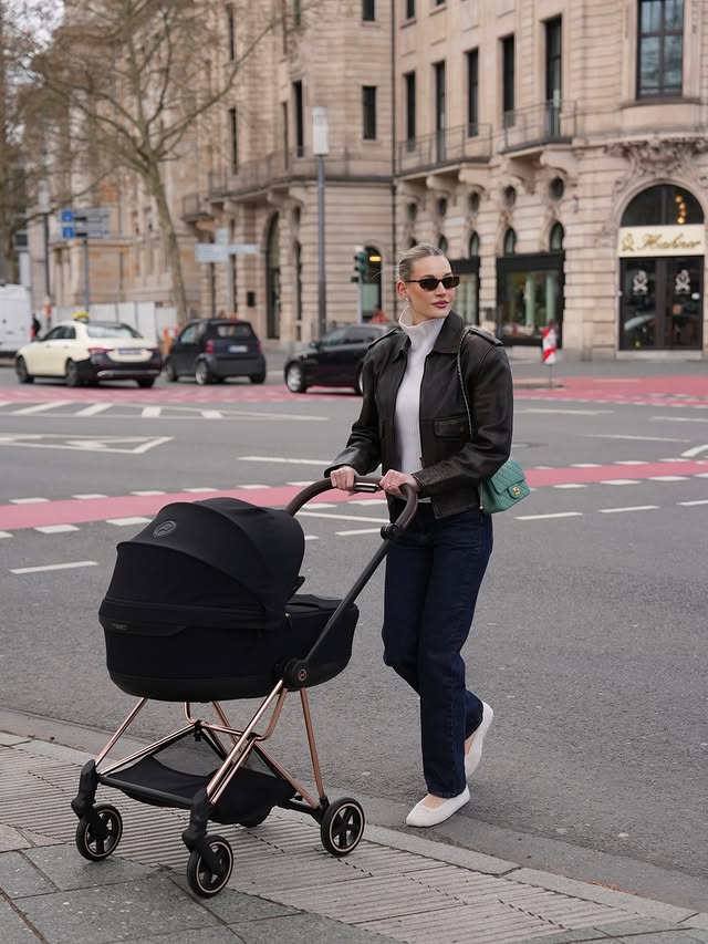 Instagram post by @mandybork for CYBEX. Caption reads: [...] the city with my little bestie & the new....