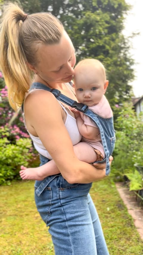 Instagram post by @thevanderwoodsfamily for The Mumsie. Caption reads: The answer to all of your baby carrier problems is....