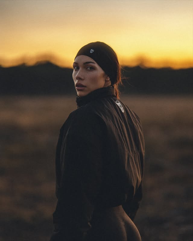 Instagram post by @gabbyfortune for Gymreapers. Caption reads: NEW Arktik Puffer Jacket @gymreapers 

wearing....