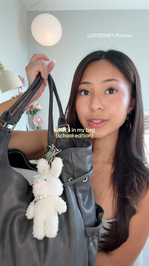 Instagram post by @soleilssofia for LISTERINE. Caption reads: #LISTERINEpartner a peek into my school bag! shop....