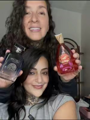 TikTok post by @lifewithmayvy for Atralia Perfumes. Caption reads: [...] Hooked me up!!! #fragrancetiktok @ATRALIA....