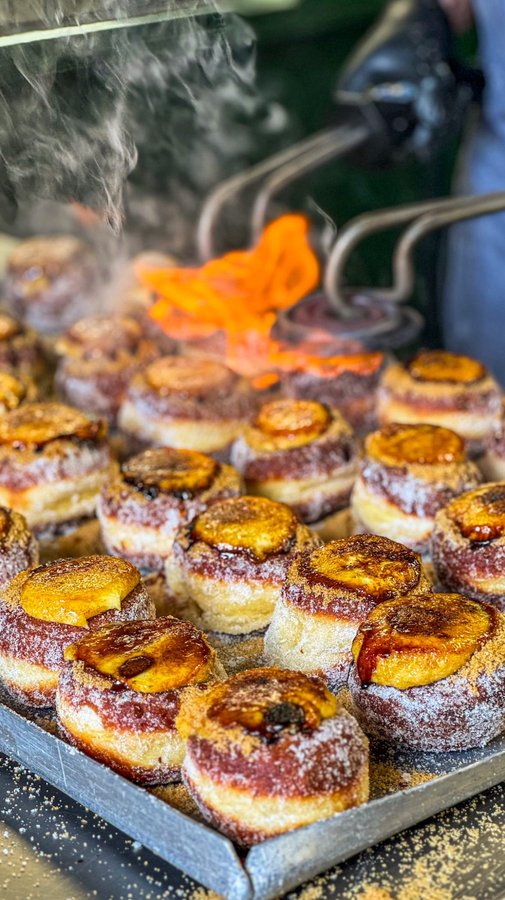 Instagram post by @yellowshoesorangeumbrella for Bread Ahead. Caption reads: Bread Ahead-Creme Brûlée Doughnut Experience....