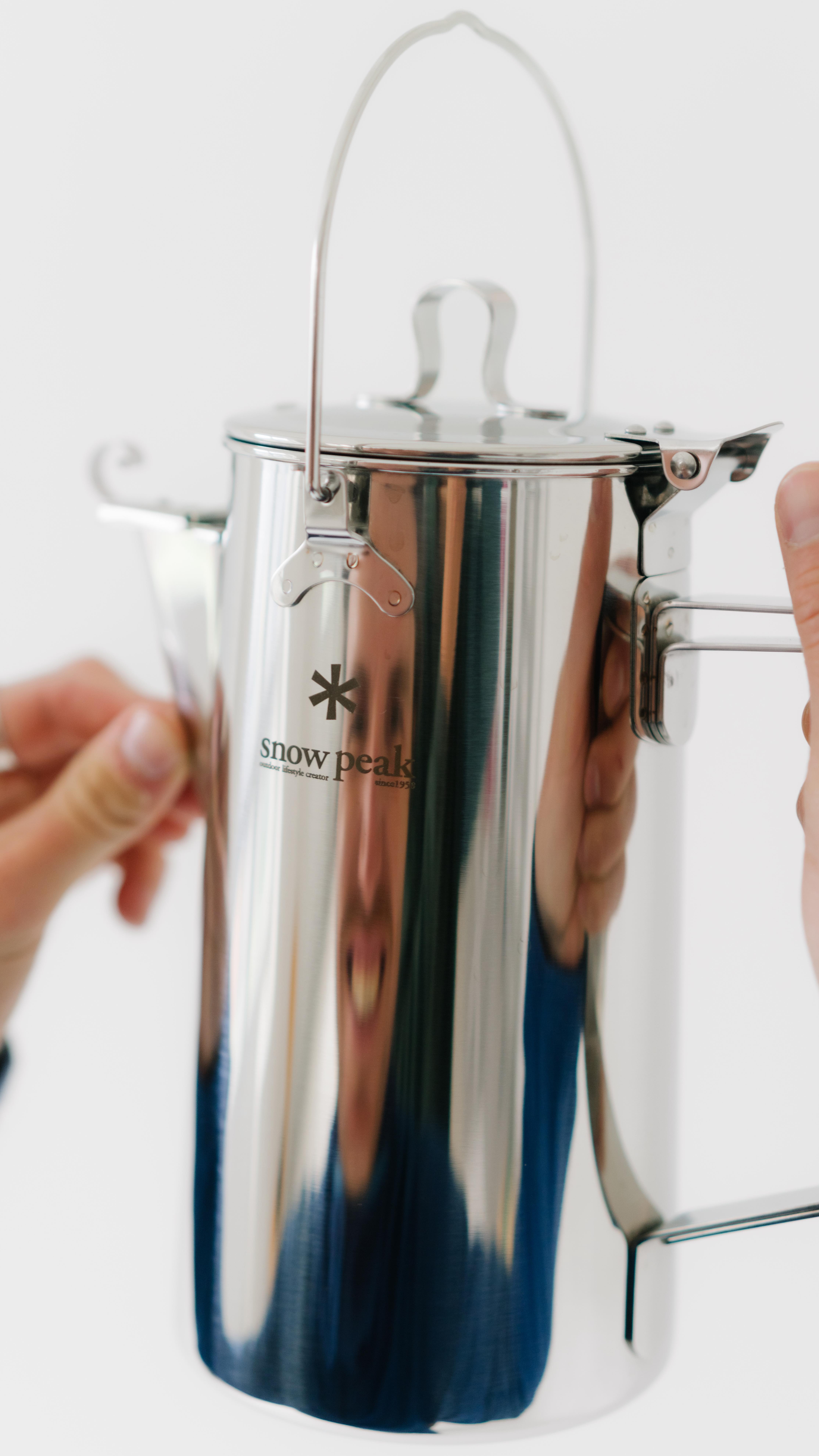 Instagram post by @outsiders.store for Snow Peak. Caption reads: Tools for simple pleasures outside....