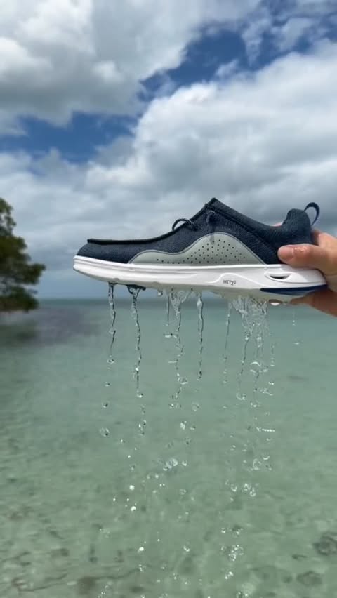 Instagram post by @reelsiestakey for HEYDUDE. Caption reads: [...] by the water just got better! 🌊 @HEYDUDE....