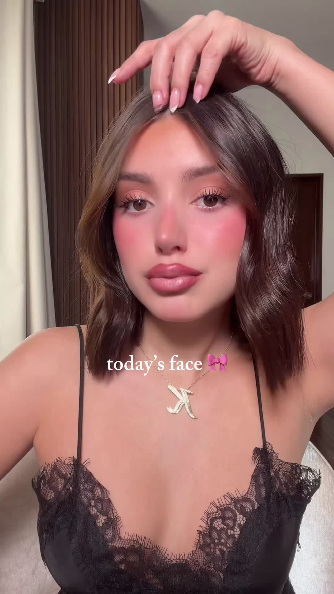 TikTok post by @michellerhoo for Hourglass Cosmetics. Caption reads: a little makeup routine 🎀 ig: michellerhoo....