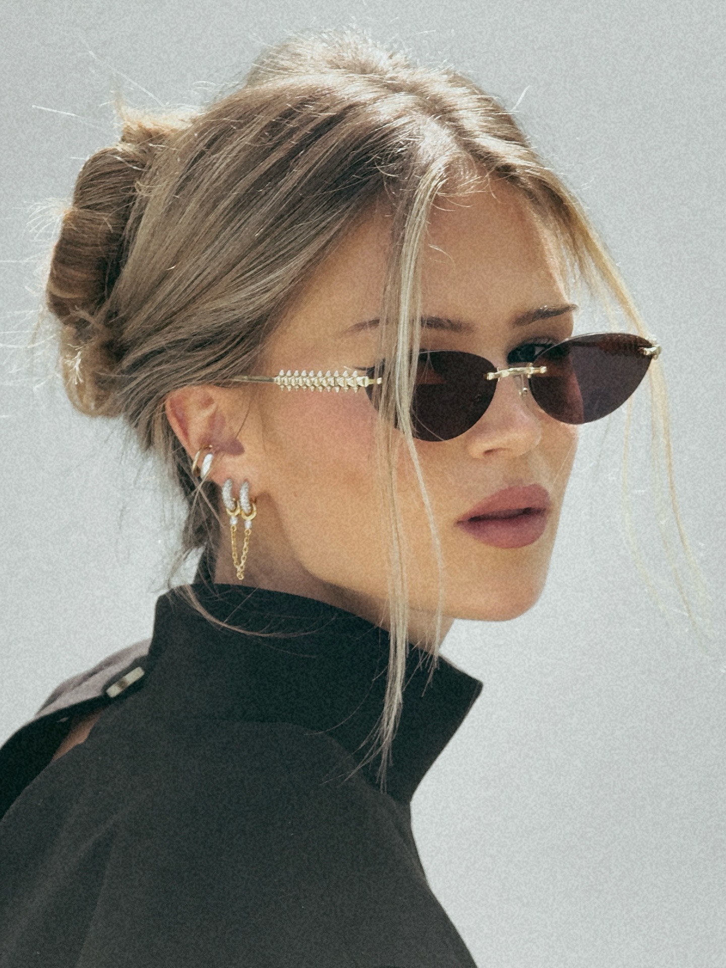 Instagram post by @hannaschonberg for Cartier. Caption reads: paid partnership @cartier | sharp frames for soft....